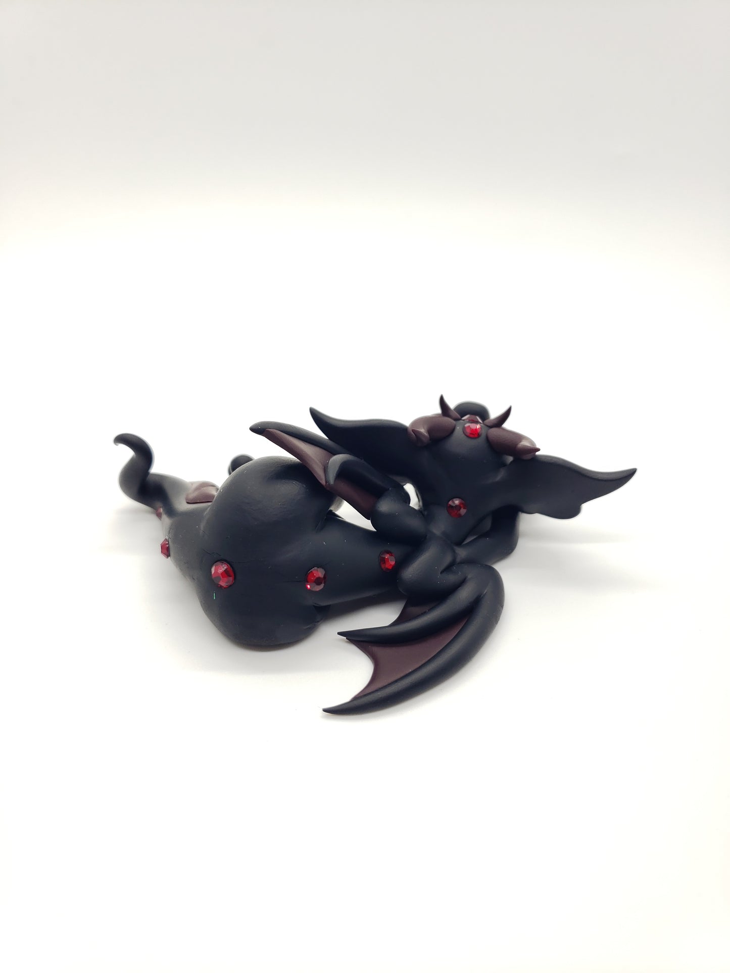 "Feronia" black and red dragon baby sculpture