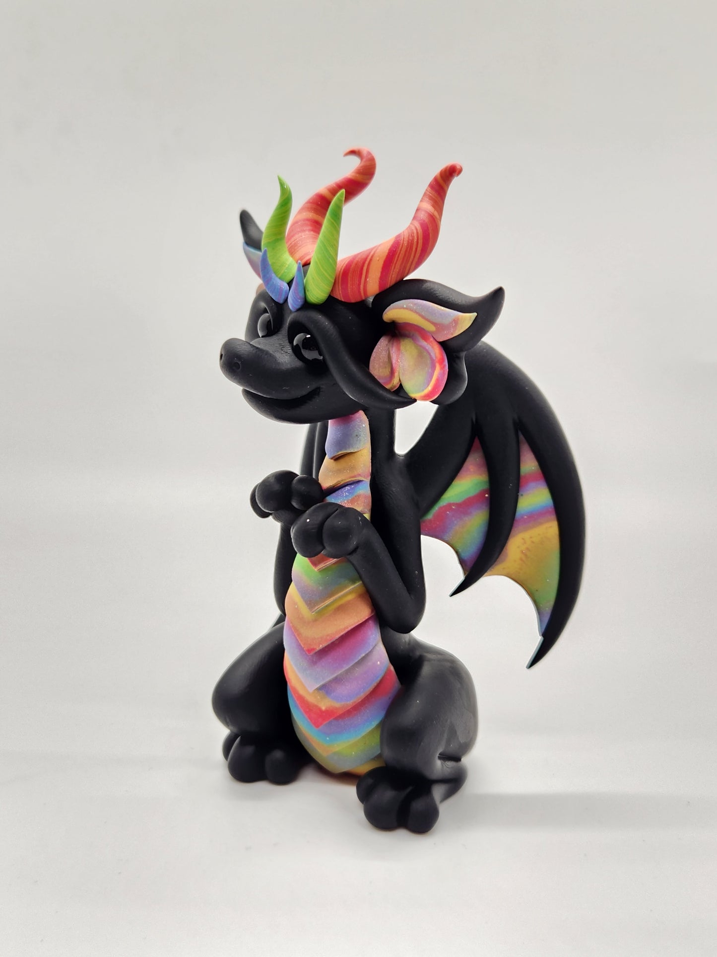 "Dathte" black and rainbow dragon sculpture