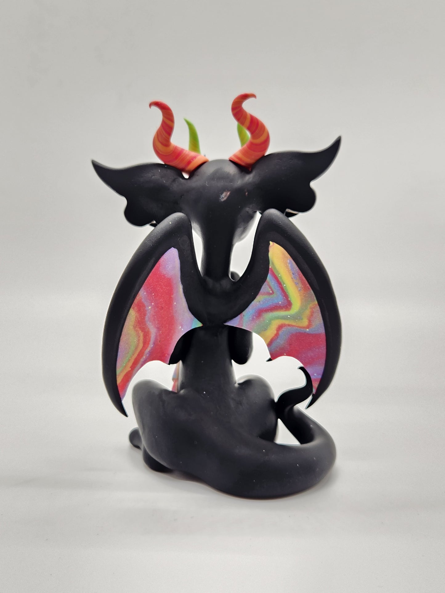 "Dathte" black and rainbow dragon sculpture