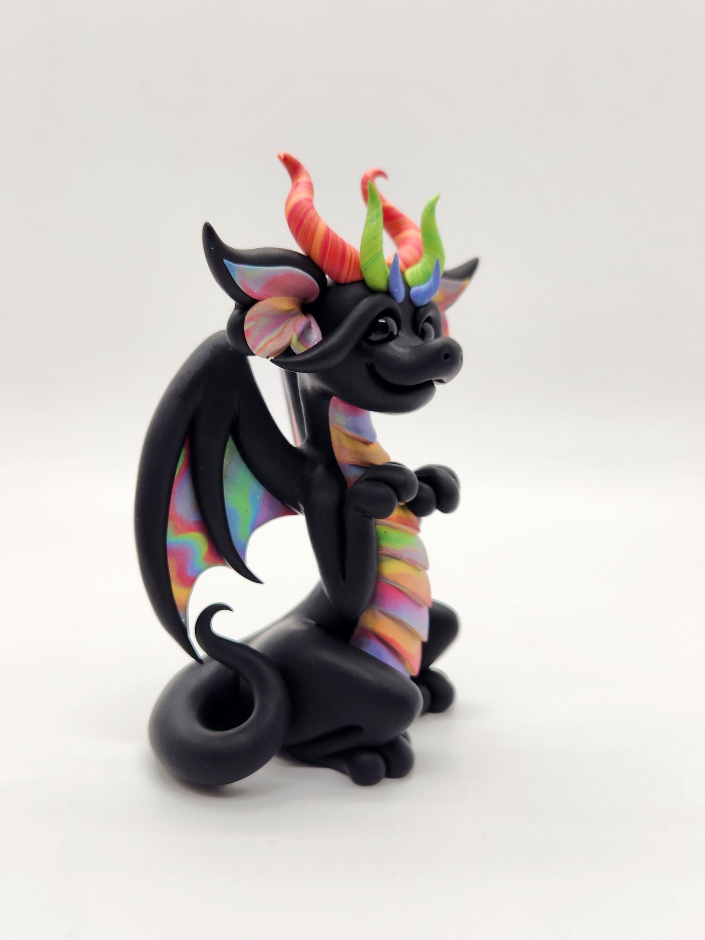 "Dathte" black and rainbow dragon sculpture