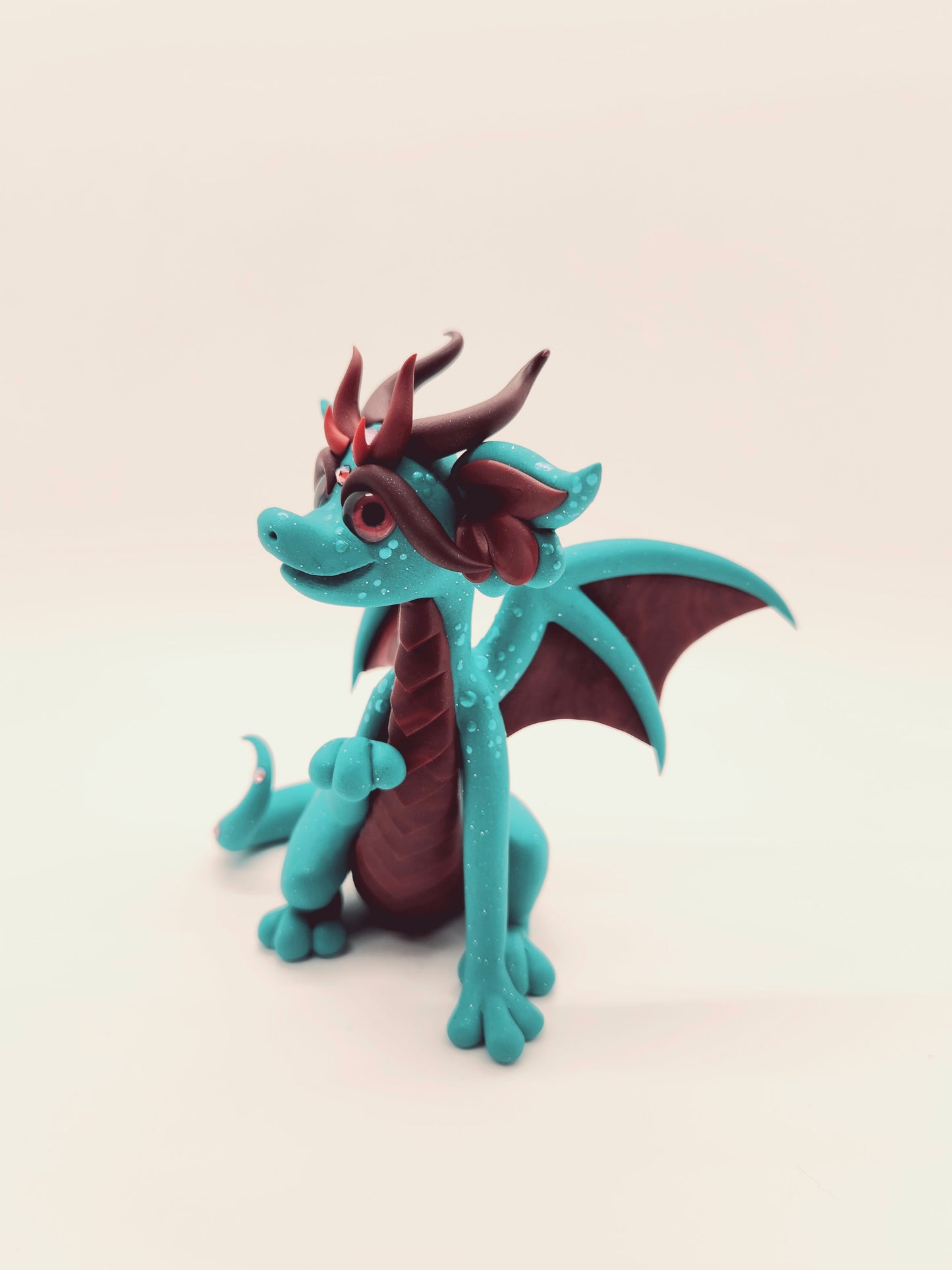 "Xalli" teal and red dragon sculpture