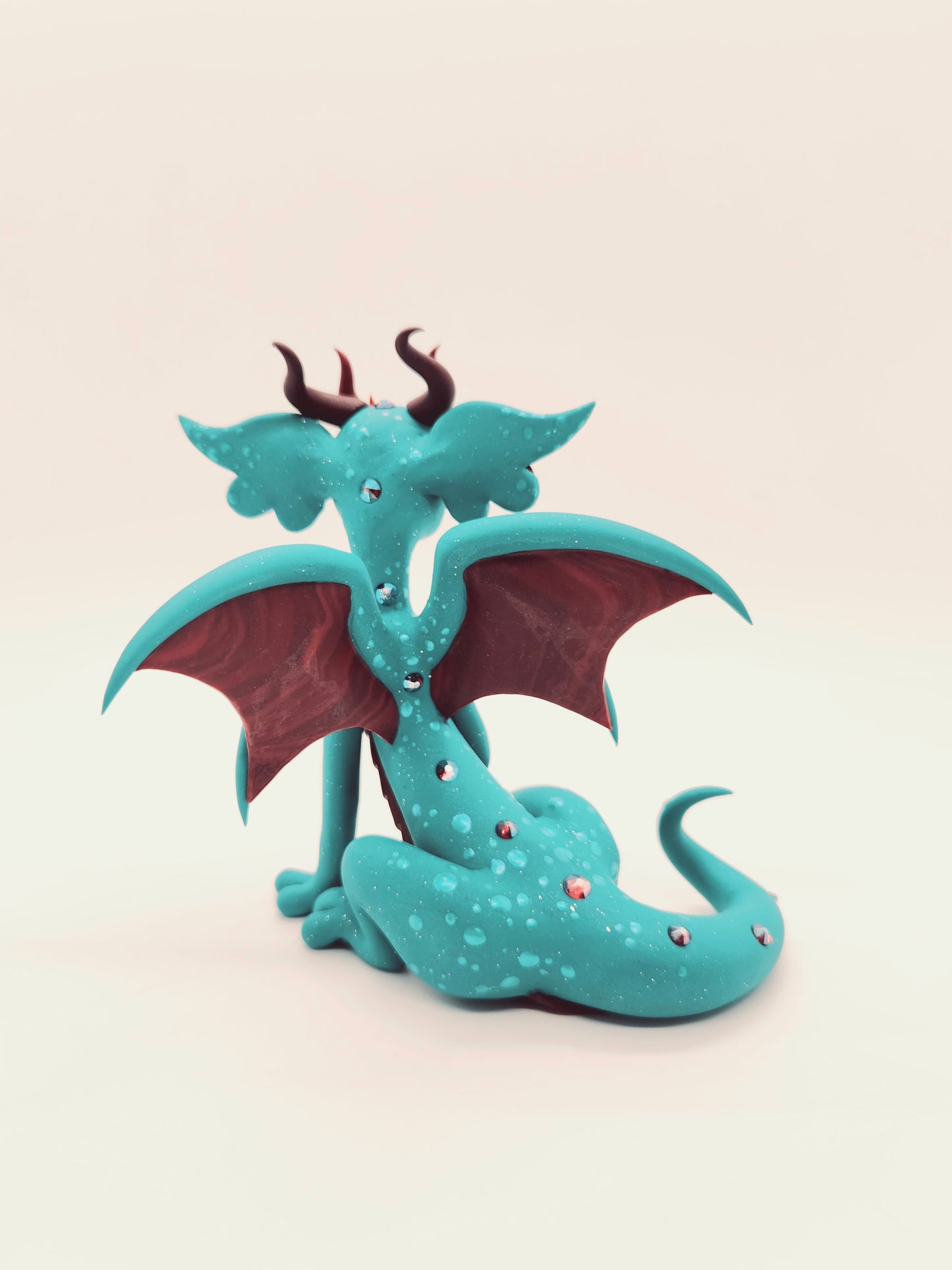 "Xalli" teal and red dragon sculpture