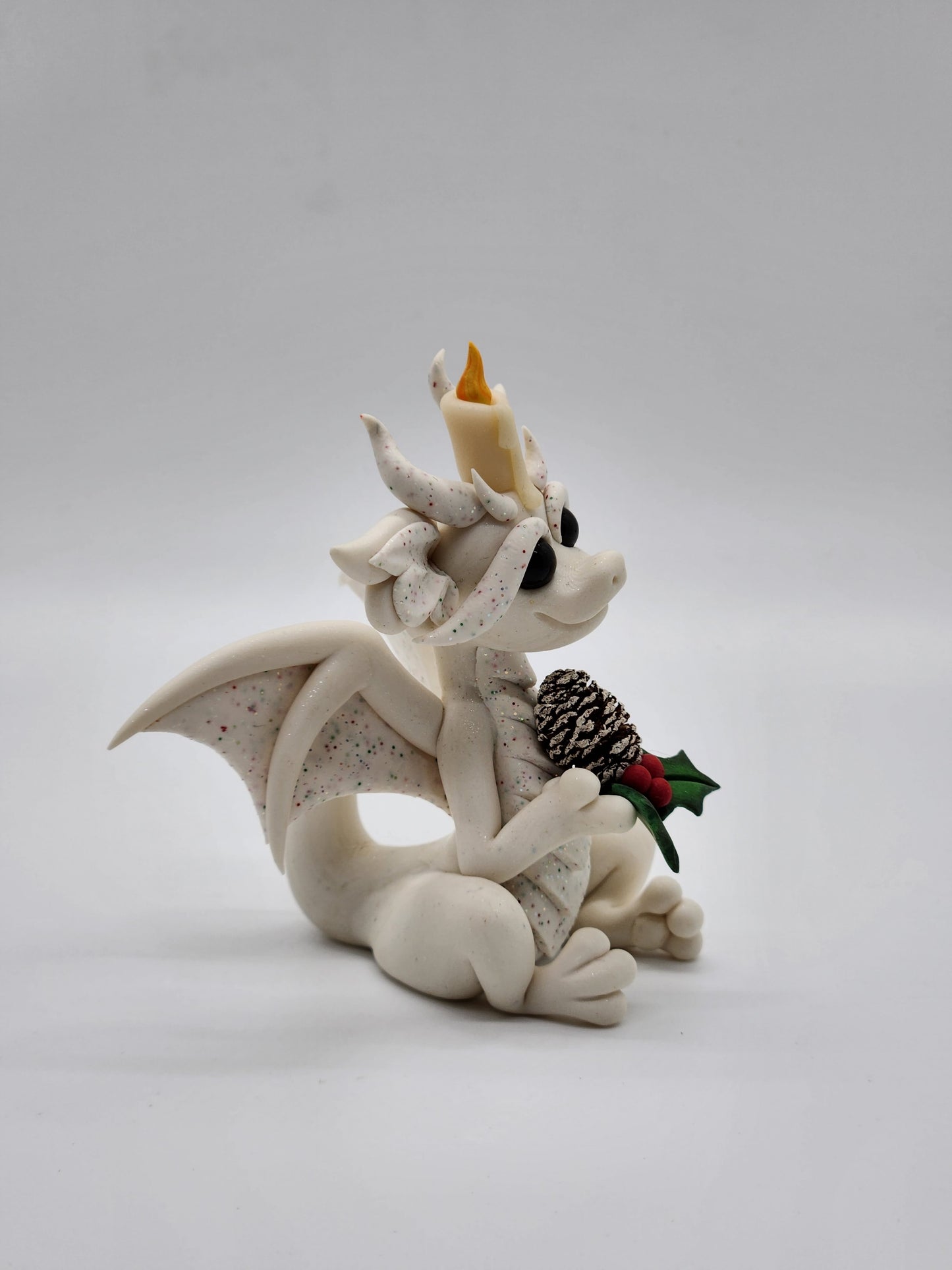 Christmas yule candle dragon sculpture