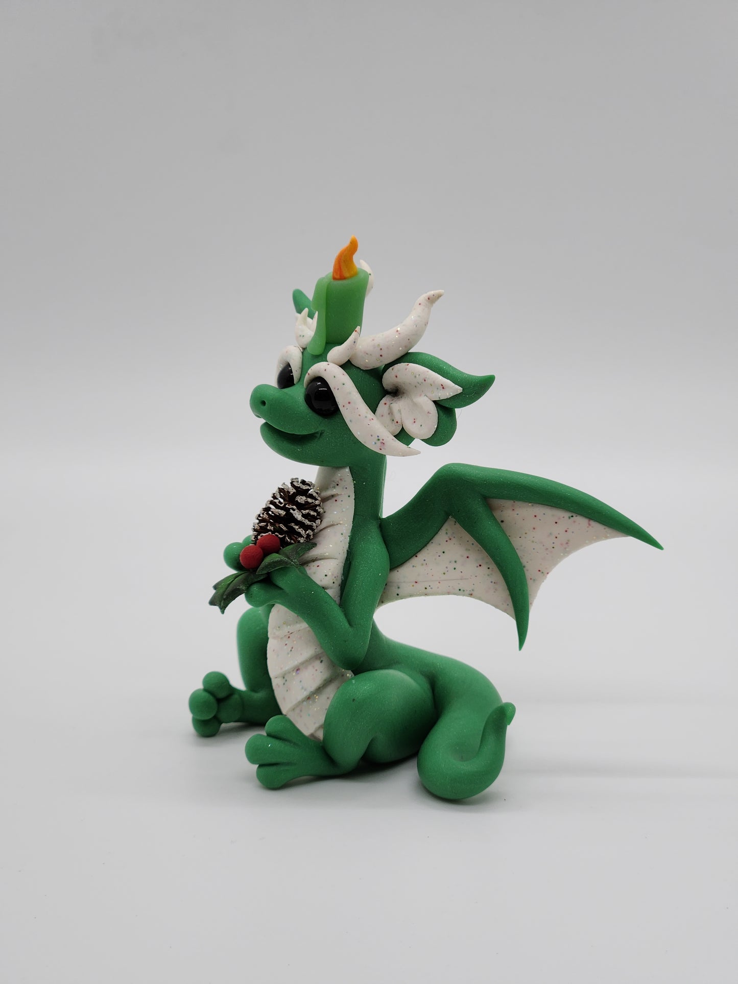 Christmas yule candle dragon sculpture