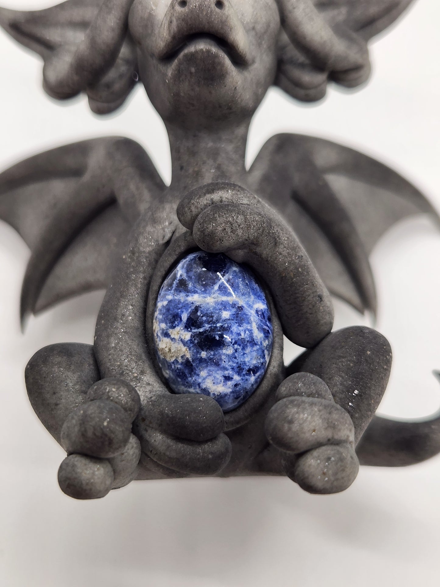 "Socha" gray dragon sculpture with lapis lazuli belly