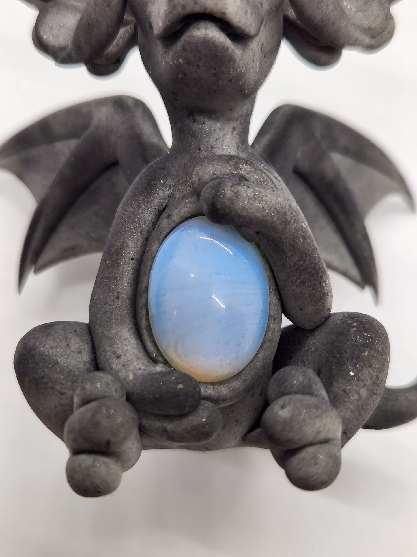 "Socha" gray dragon sculpture with opalite belly