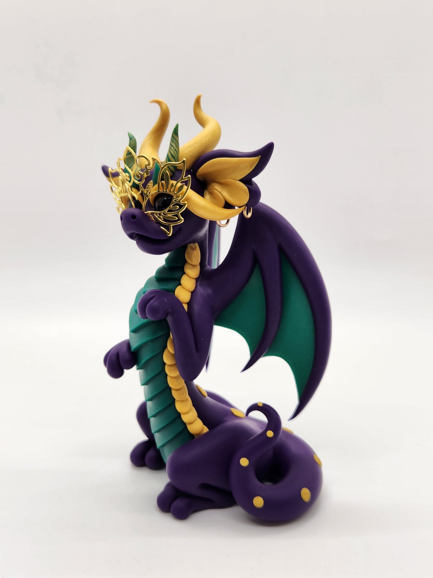 "Fleur" purple masked mardi gras dragon sculpture