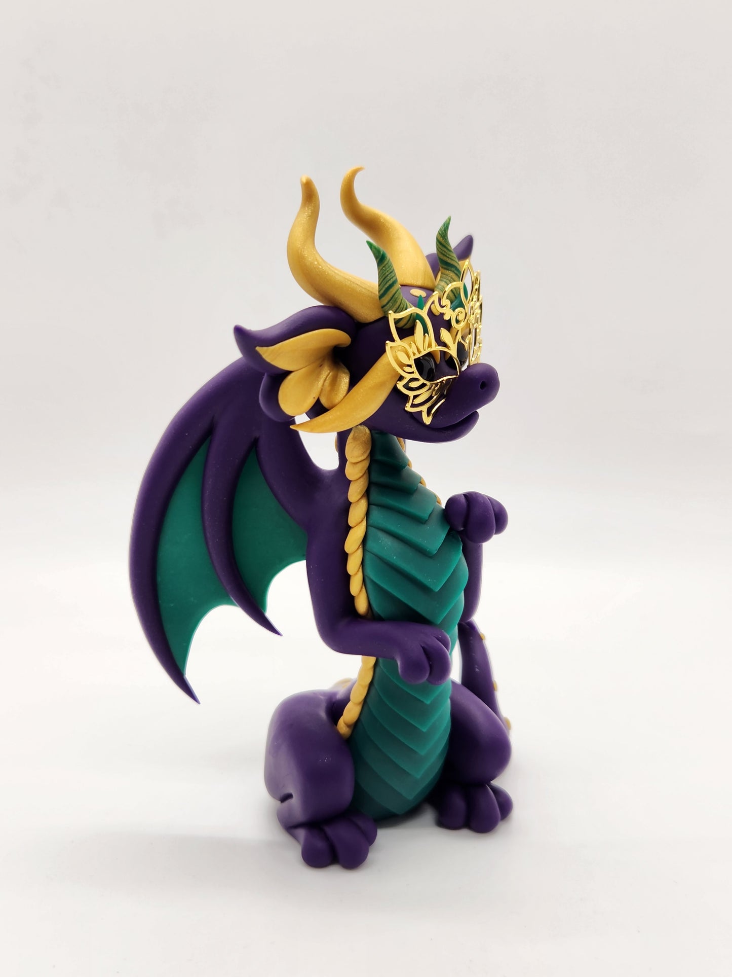 "Fleur" purple masked mardi gras dragon sculpture