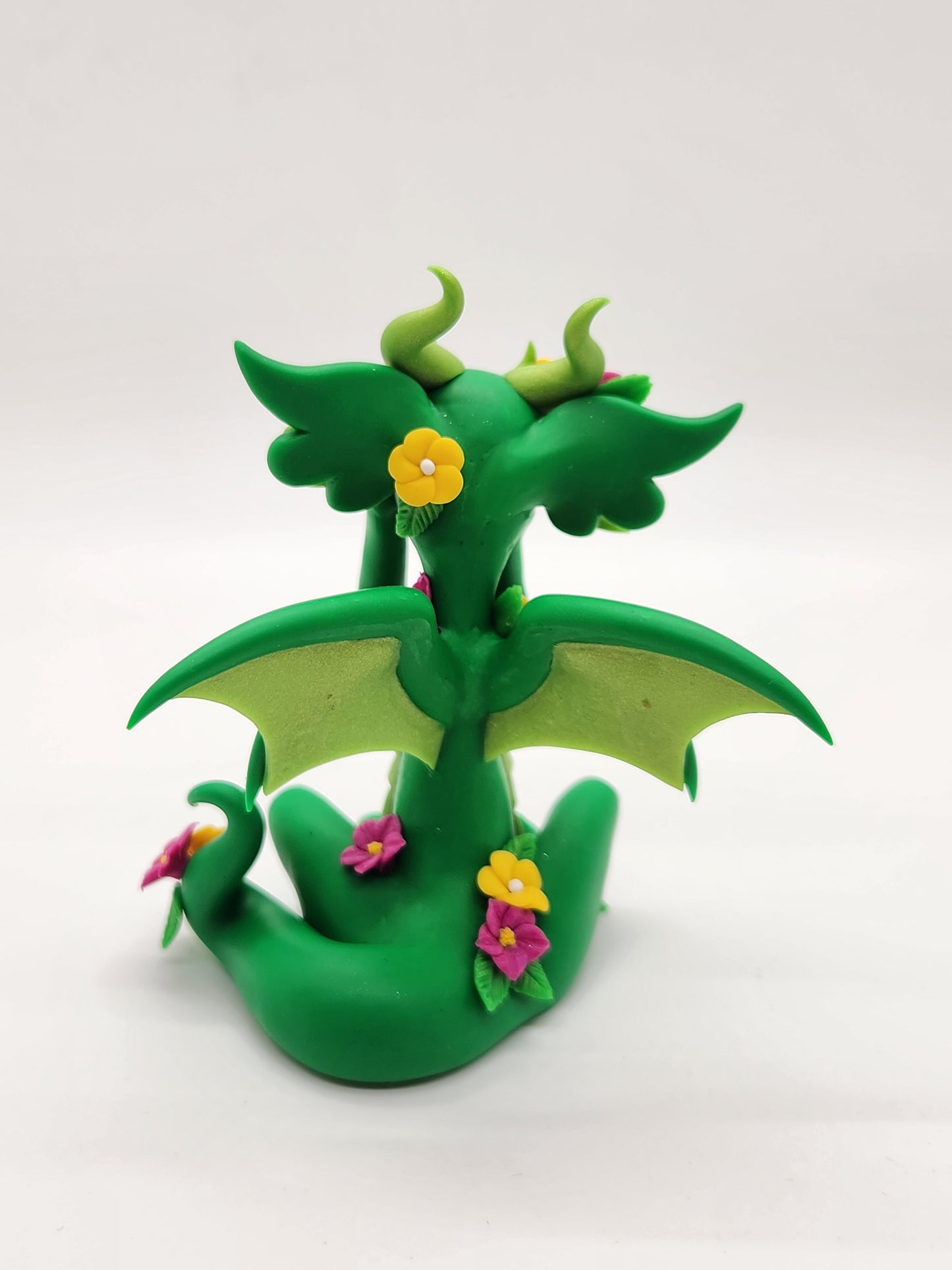 "Novi" green spring flowers dragon sculpture