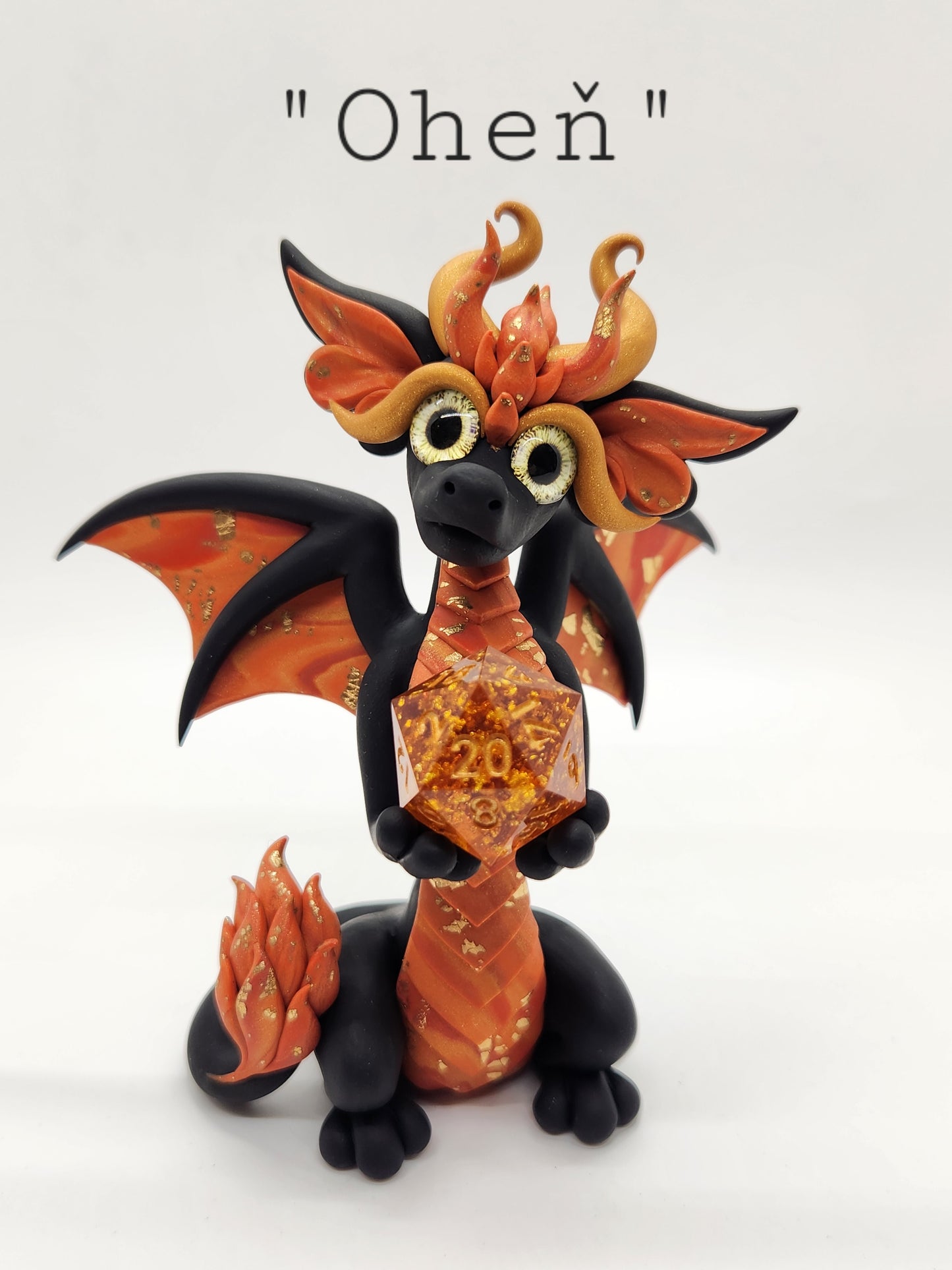 "Oheň" black and orange fire d20 dragon sculpture