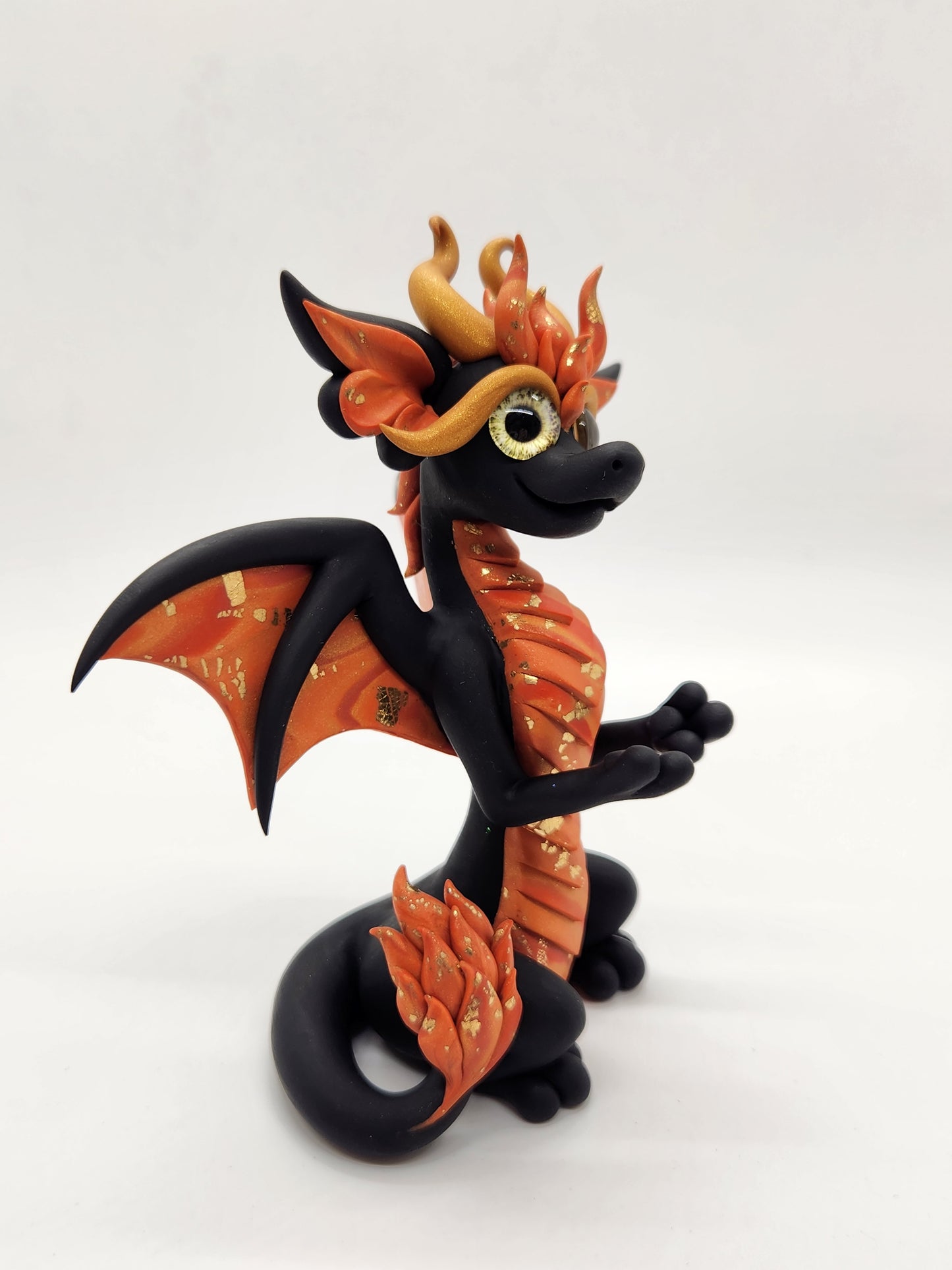 "Oheň" black and orange fire d20 dragon sculpture