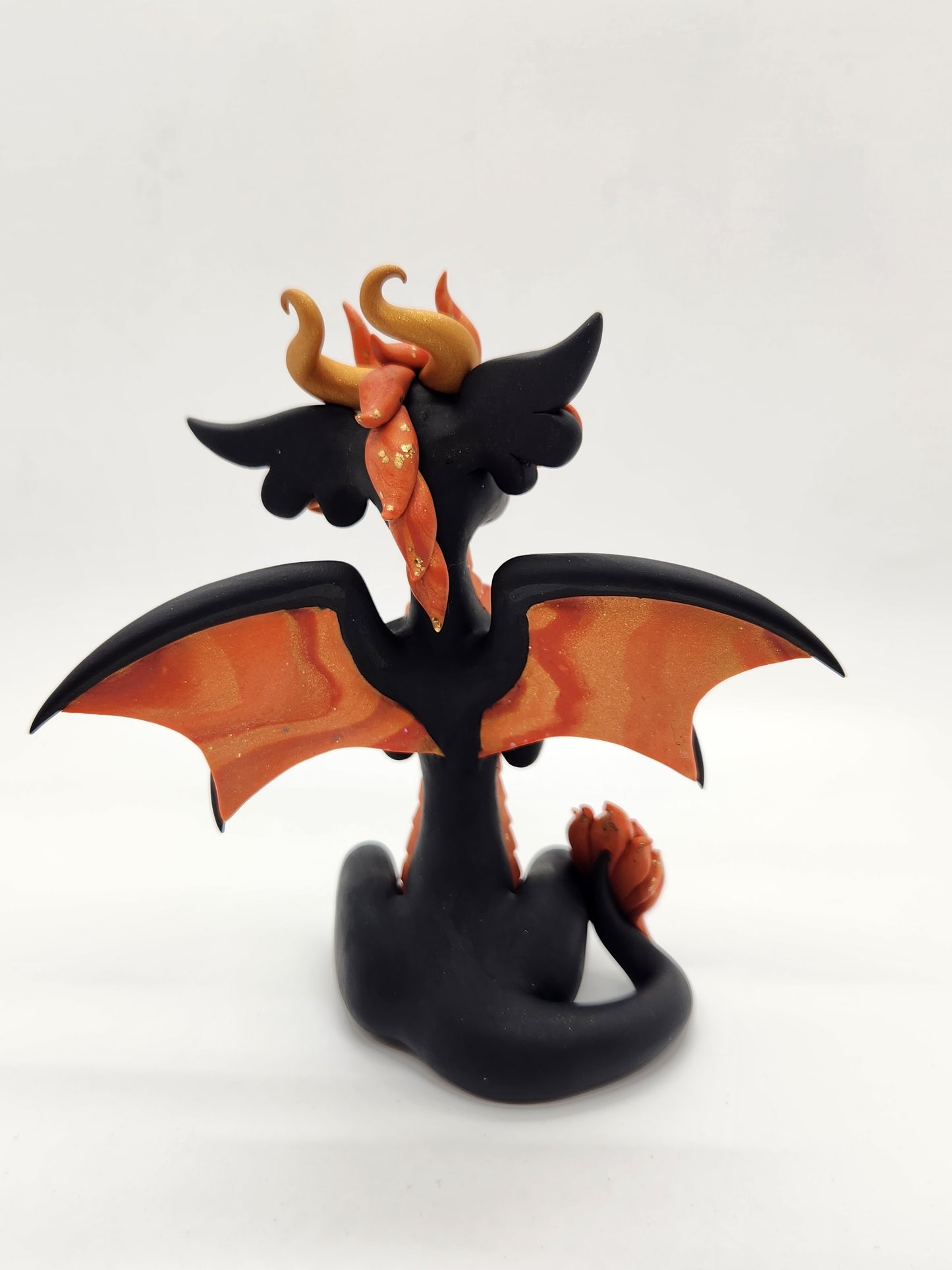 "Oheň" black and orange fire d20 dragon sculpture