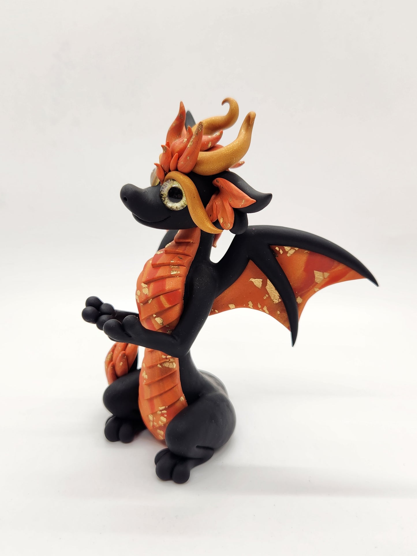 "Oheň" black and orange fire d20 dragon sculpture