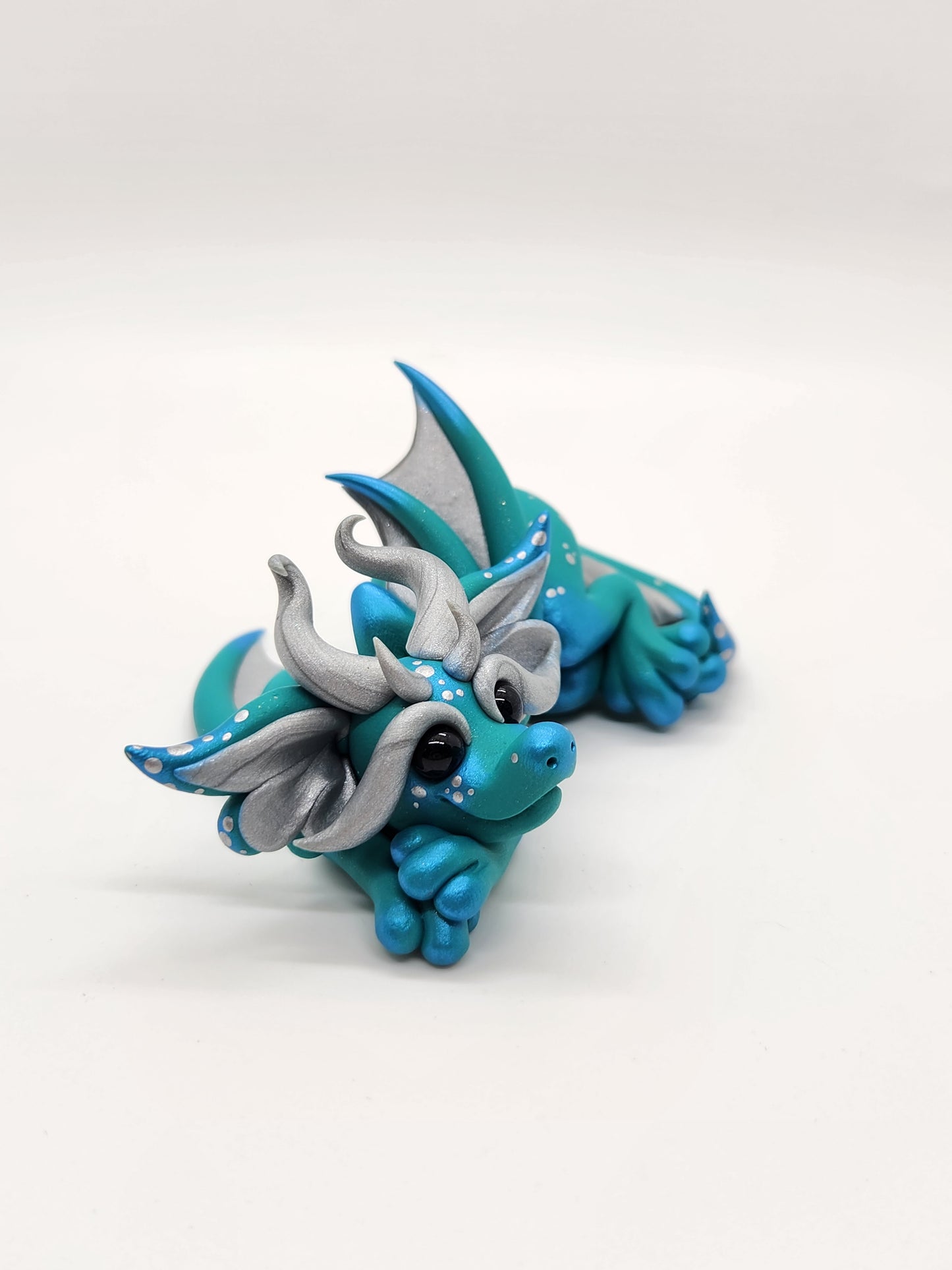 "Petit" teal mini dice set dragon sculpture