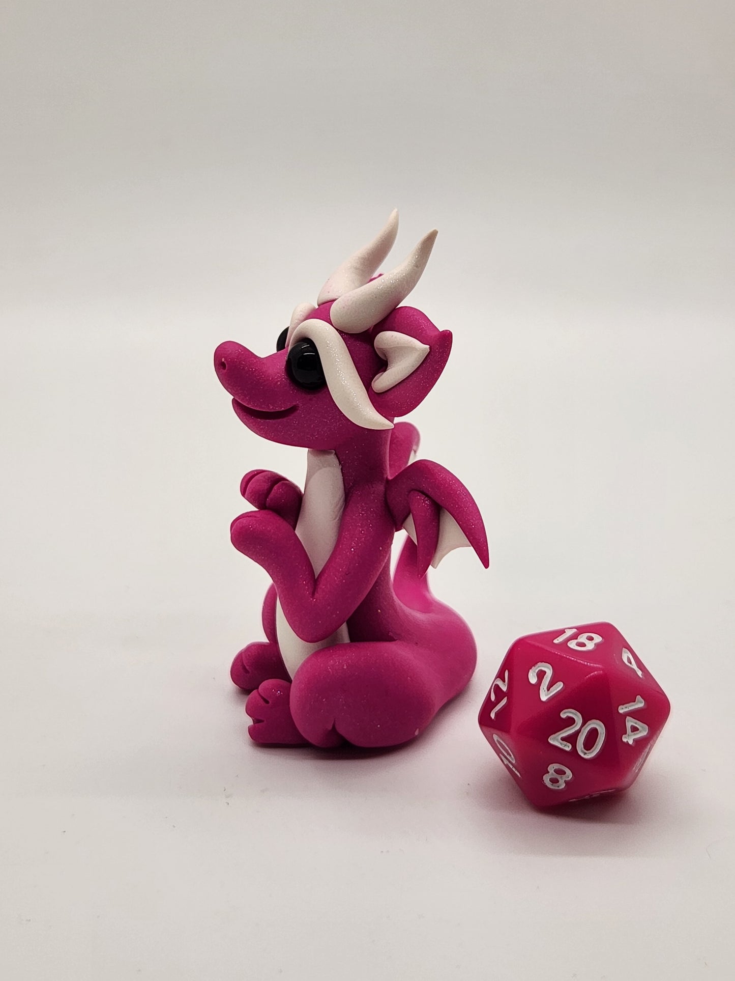 "Aami" pink squish baby dragon with d20