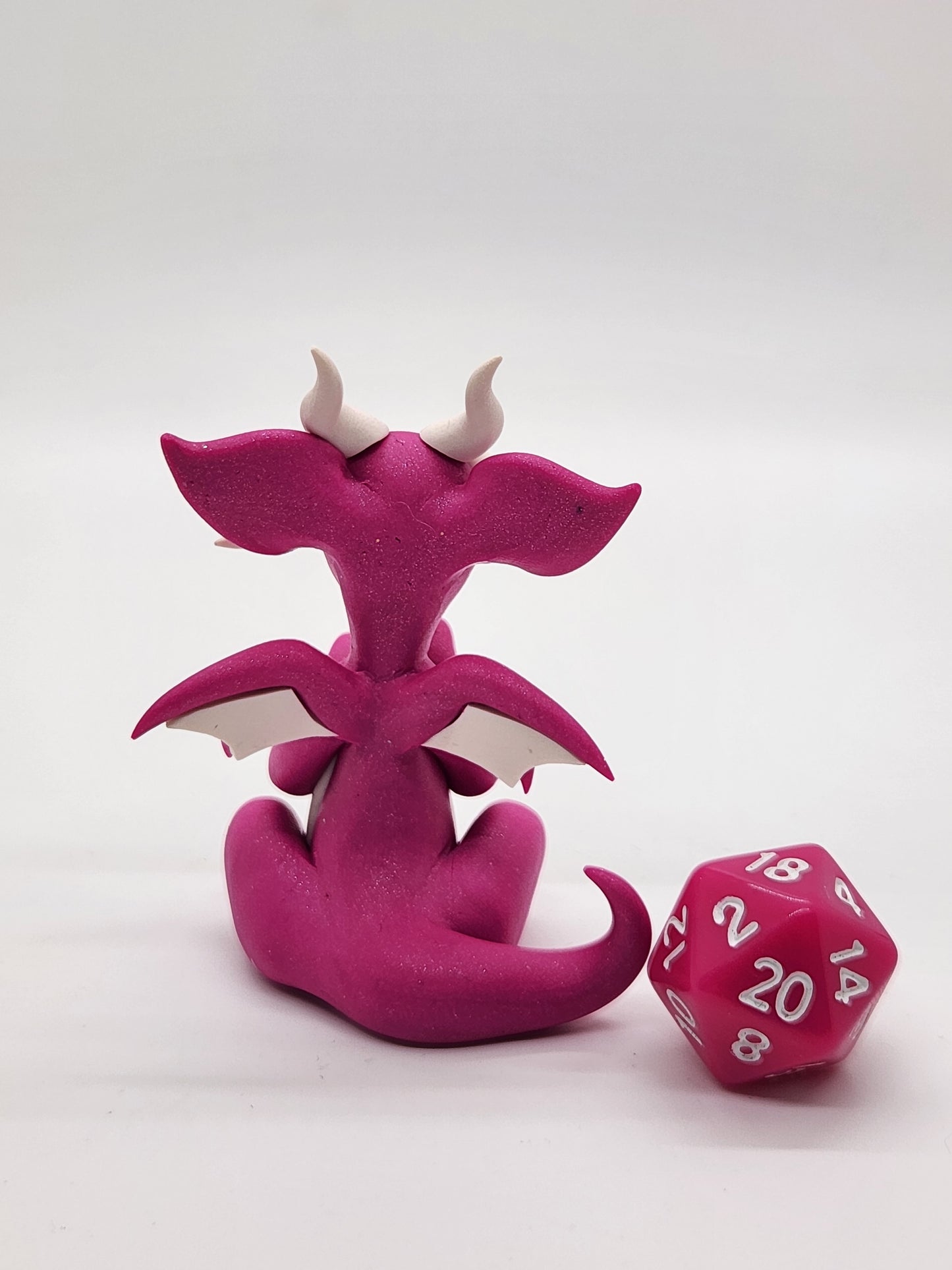 "Aami" pink squish baby dragon with d20